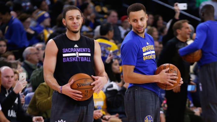 Watch: Stephen Curry hits three over arms of his brother, Seth, in win