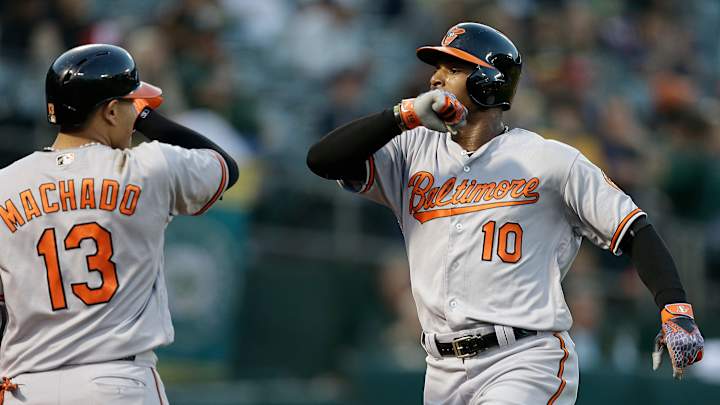 Smolinski, Neal help A's win second straight over Orioles