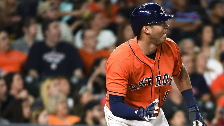 Suarez helps Reds down Astros 4-2 in 11 innings