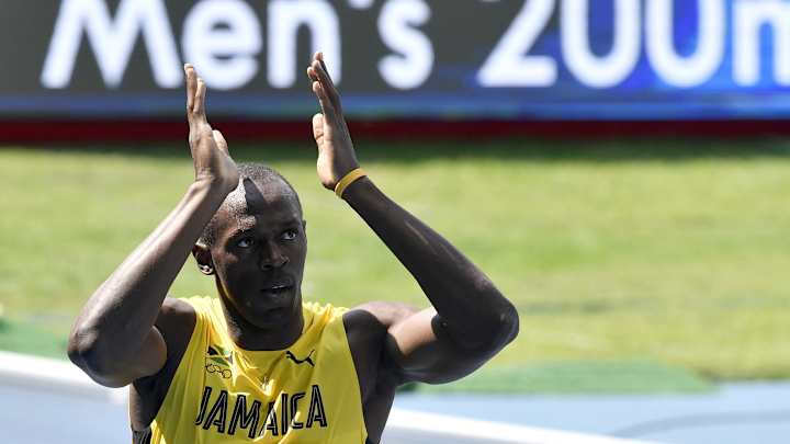 In a breeze, Bolt starts pursuit of 200-meter title