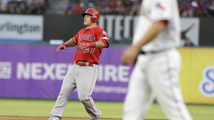 Pujols hits 569th homer, Angels beat Rangers 2-0