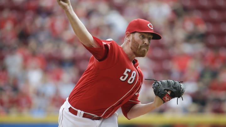 Strasburg limps off, Nationals lose to Reds 6-3