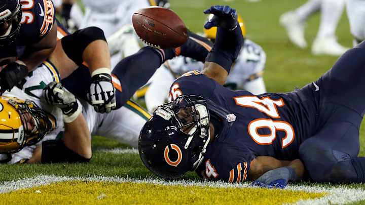 Rodgers throws 3 TD passes, Packers beat Bears 26-10