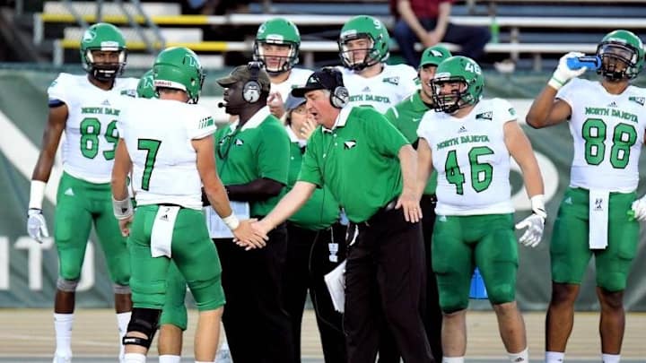 North Dakota extends Schweigert through 2021