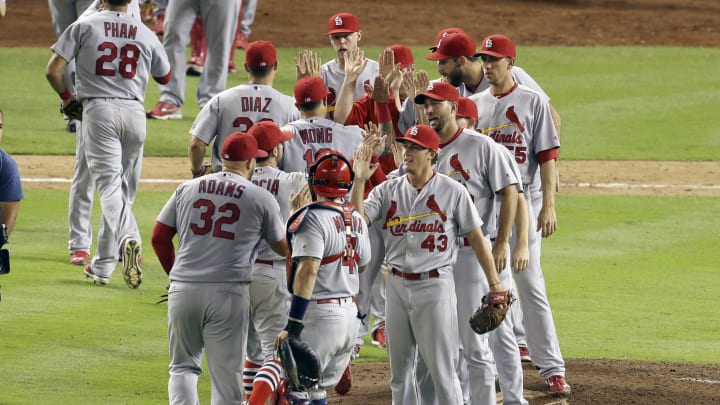 Pham homers, drives in 3 to lead Cardinals over Marlins