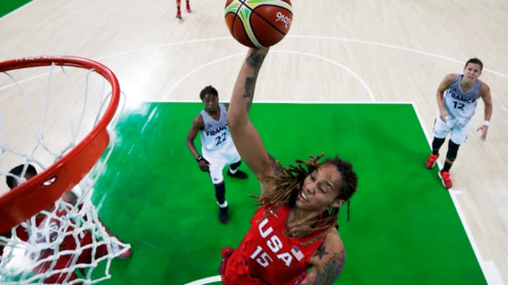 The Latest: Women seek Rio gold in basketball, golf, biking