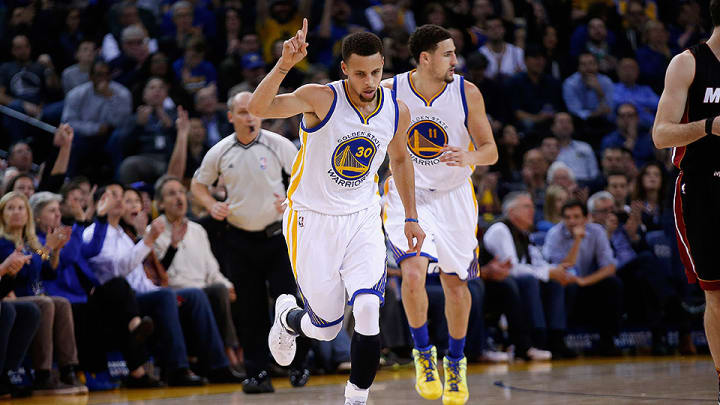 Stephen Curry, Warriors top Heat to stay undefeated at home