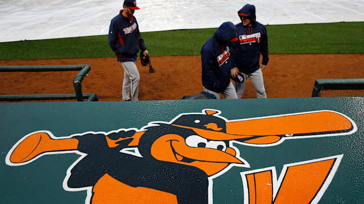 Orioles beat Twins 3-2 in opener marred by 2 rain delays
