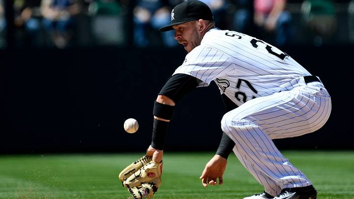 Rockies sideline reporter makes nice grab on sharply hit grounder Rockies sideline reporter makes nice grab on sharply hit grounder