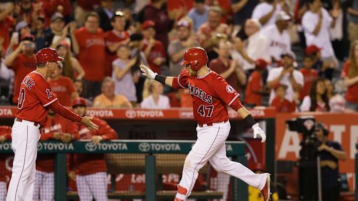 Semien, Davis lead A's to 5-4 win over Angels