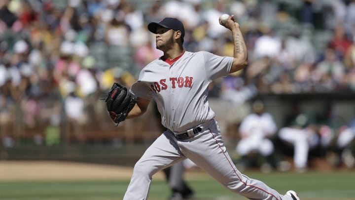 A's get 1st hit on replay reversal in 8th, edge Red Sox 1-0