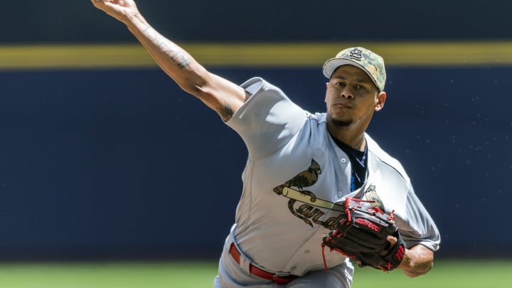 Martinez, Carpenter help Cardinals shut down Brewers 6-0