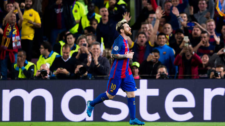 Messi, Ozil hat tricks lead Barcelona, Arsenal to key Champions League wins
