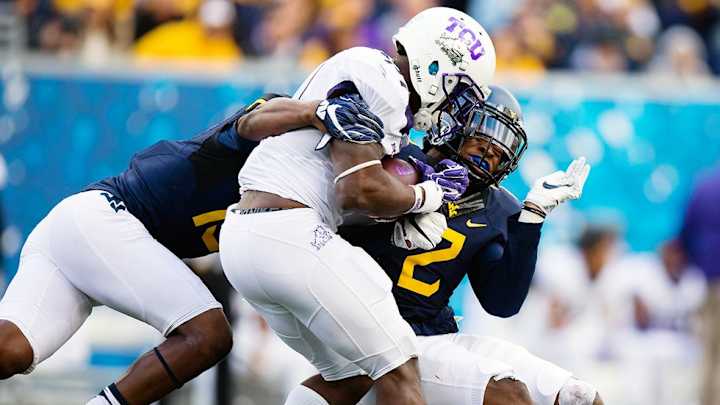 'I get on their asses if they give up a yard': The secret to West Virginia's defensive success in high-scoring Big 12 'I get on their asses if they give up a yard': The secret to West Virginia's defensive success in high-scoring Big 12