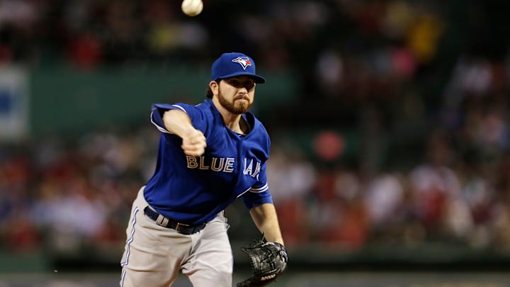 Blue Jays pitcher hit in head by catcher's throw