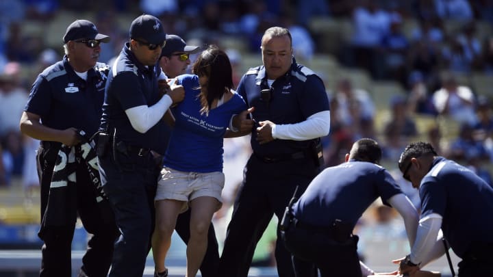 Animal rights protesters delay Dodgers-Rockies game