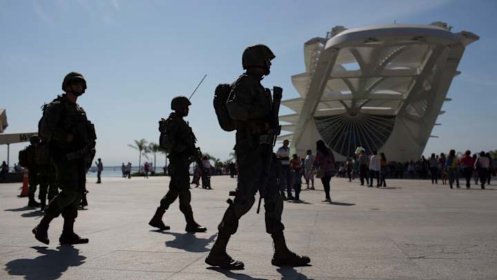 Armored cars, soldiers in camouflage secure Rio Olympics