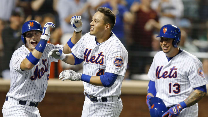 Flores, Mets rally past Nationals 9-7 in series opener