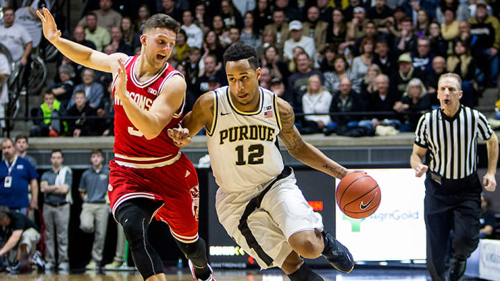 Edwards withdraws from NBA draft, will play again for Purdue