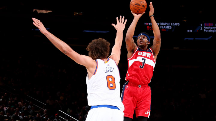 Wall, Wizards ruin Rambis' Knicks debut with 111-108 win