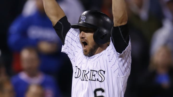 Rockies rally for 2 in 11th vs Chapman, edge Cubs on error