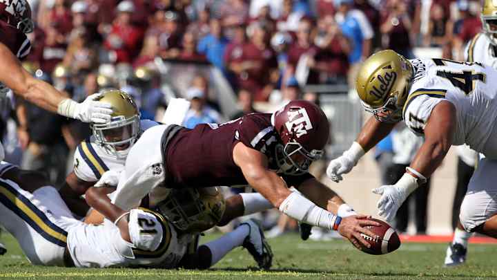 Knight's TD run in OT lifts Texas A&M over No. 16 UCLA 31-24 Knight's TD run in OT lifts Texas A&M over No. 16 UCLA 31-24
