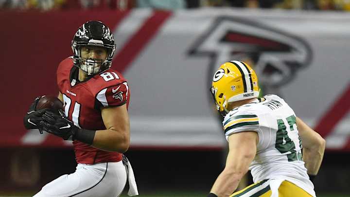 Packers' G T.J. Lang, LB Jake Ryan to miss Redskins game