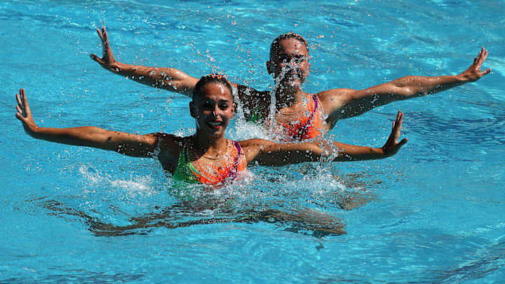 Olympic pool returns to normal color after being drained, refilled