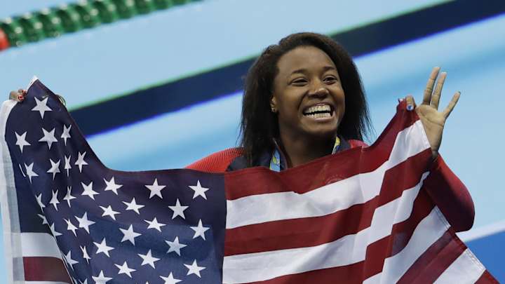 Manuel becomes first African American woman to win swim gold