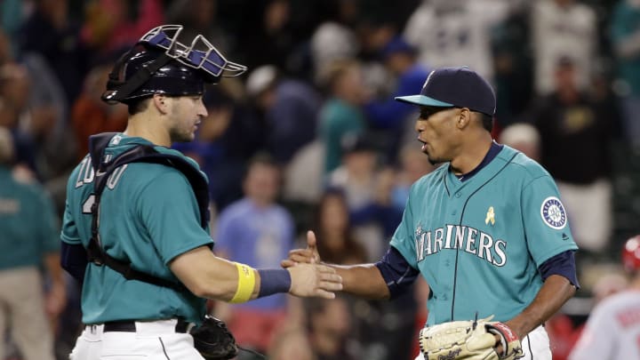 Mariners score 9 in 2nd inning, hold off Angels 11-8