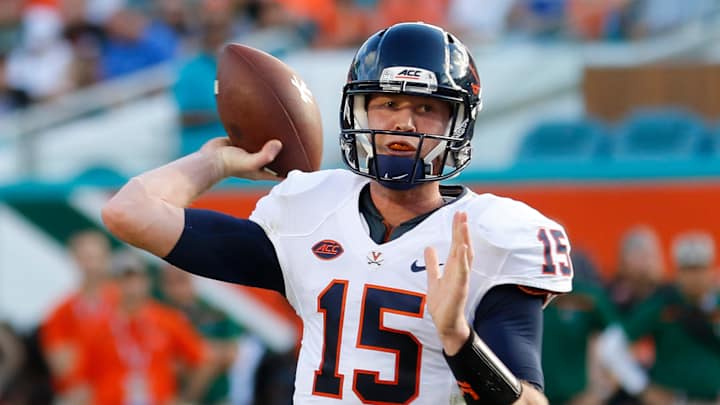 QB Johns embraces changes at Virginia even with job in limbo
