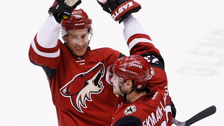 Domi, Ekman-Larrson rally Coyotes past Oilers 4-3 in OT