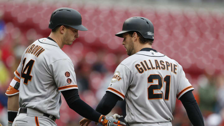 Reds hit 4 homers in 7-4 win over Giants, avoiding sweep