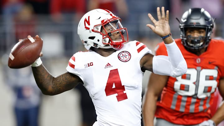 Nebraska QB Armstrong carted off heads slams on ground
