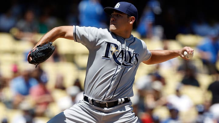 Giants pick up Rays' Moore, Brewers' Smith in pair of trades