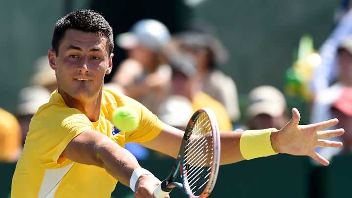Djokovic criticizes Tomic for giving up on match point