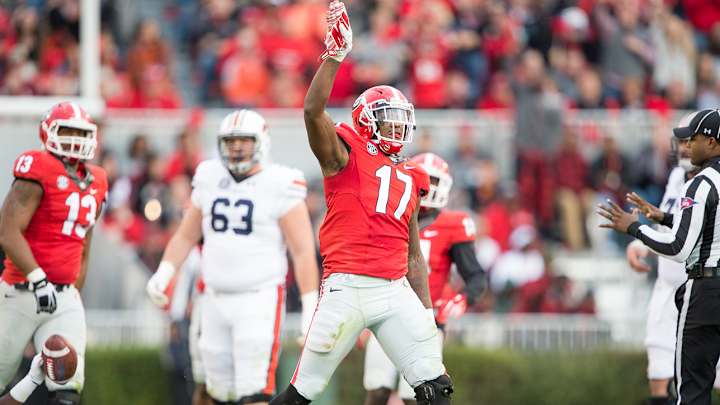 No. 9 Auburn's playoff hopes vanish with upset loss at Georgia