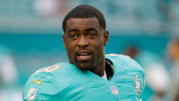 Dolphins' Jones reports after missing 1st day of minicamp