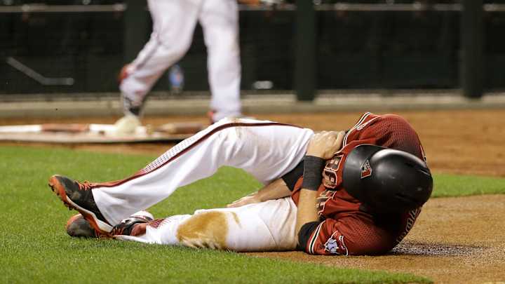 Arm in sling, AJ Pollock puts best face on busted elbow