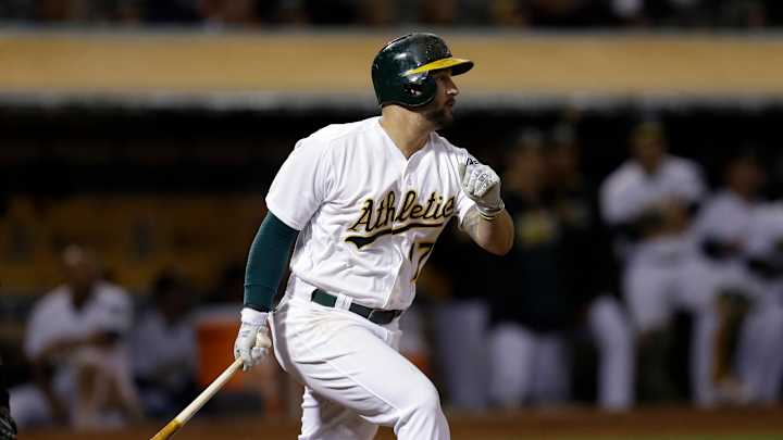 Athletics score 3 in 7th to beat Brewers 5-3