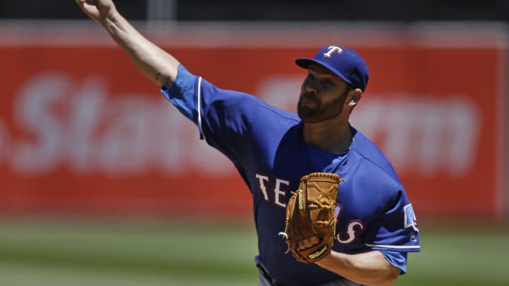Rangers' Lewis pitching perfect game thru 6 innings vs A's