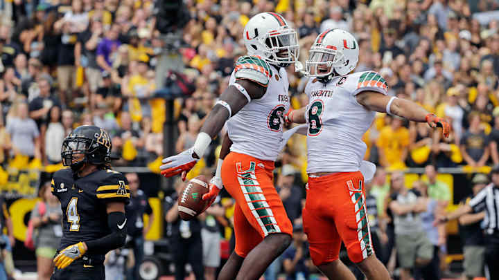 COLLEGE PICKS: Washington, Miami try to snap rivalry skids