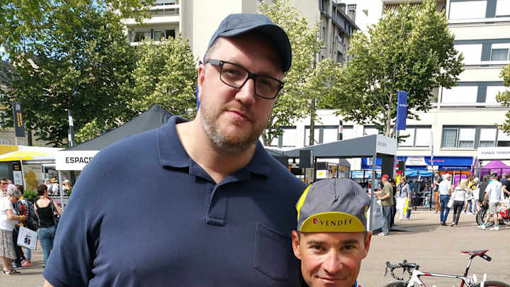 Please enjoy this photo of Frederic Weis and a cyclist