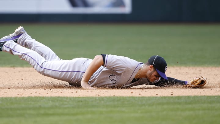 Arenado hits 11th, Parra homers as Rockies sweep Arizona