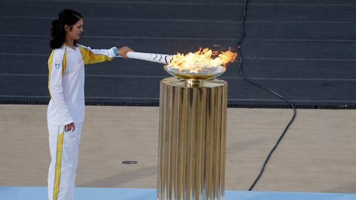 Rio gets Olympic flame 100 days before games