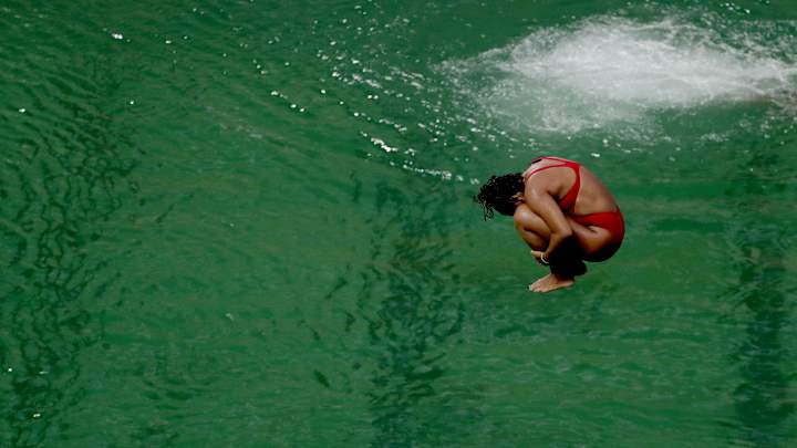Olympic pool where water turned green closed for practice