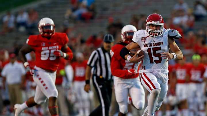 New Mexico cruises past South Dakota 48-21 New Mexico cruises past South Dakota 48-21