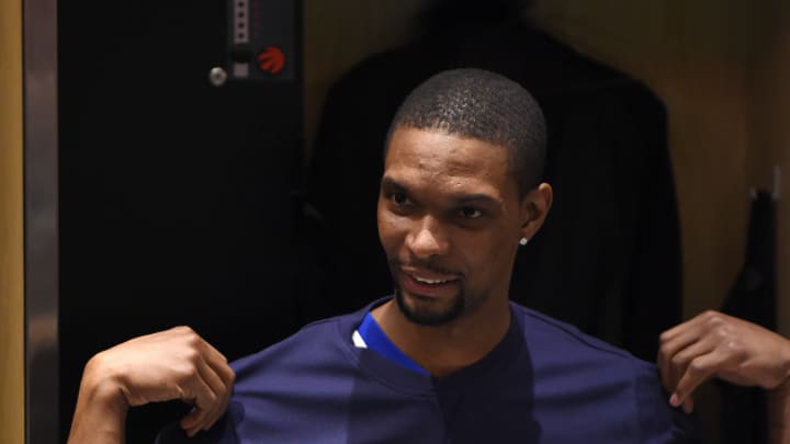 Bosh returns to Heat bench for 1st time since break Bosh returns to Heat bench for 1st time since break