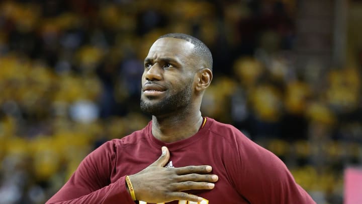 James' triple-double powers Cavs to rout of Raptors