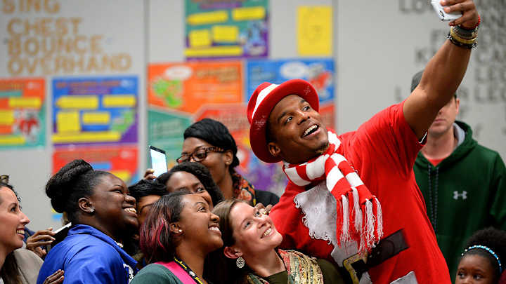 Watch: Cam Newton wears Santa costume at his annual charity event Watch: Cam Newton wears Santa costume at his annual charity event